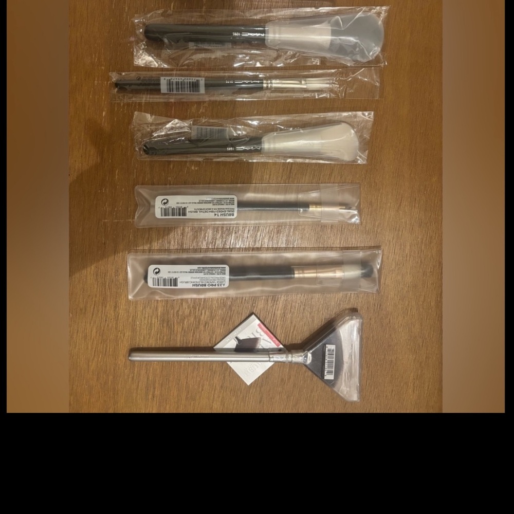 No offers! Brand name Cosmetics Brush Set - Black, White, and Silver.